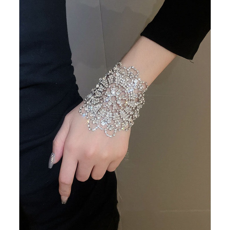 Stylish Silk Copper Zircon Floral Hollow Out Tassel Charm Bracelet