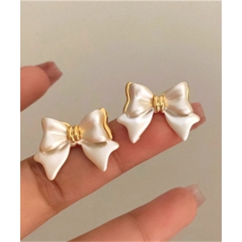 Art White Copper Alloy Bow Stud Earrings